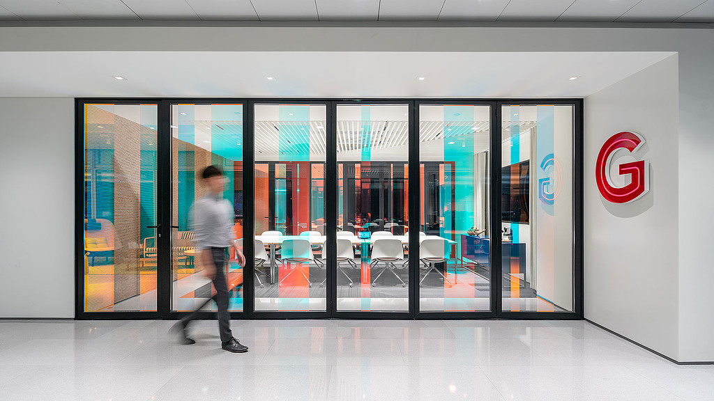 A person walking in a building.